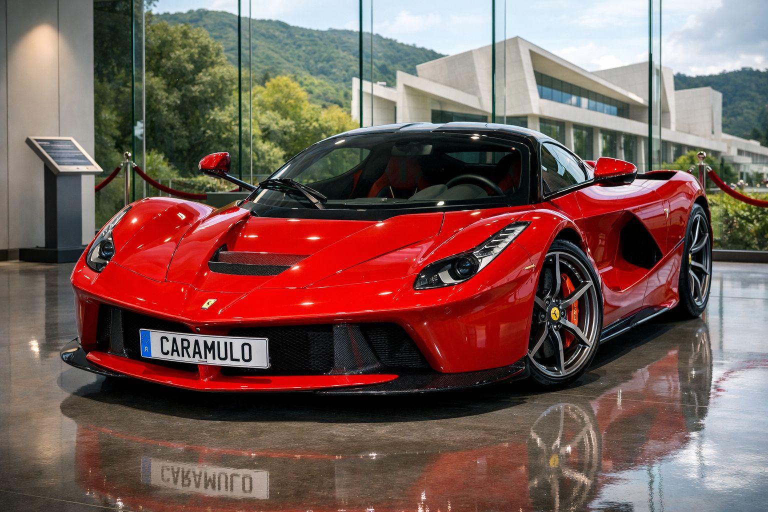 Carro esportivo vermelho Ferrari estacionado em ambiente interno com janela de vidro e fundo de montanha.